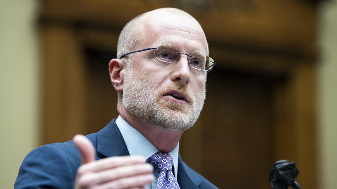 Federal Communications Commission Commissioner Brendan Carr speaks and gestures with his hand while testifying at a Congressional hearing