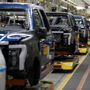 Ford Motor Company's electric F-150 Lightning on the production line at their Rouge Electric Vehicle Center in Dearborn, Michigan on September 8, 2022.