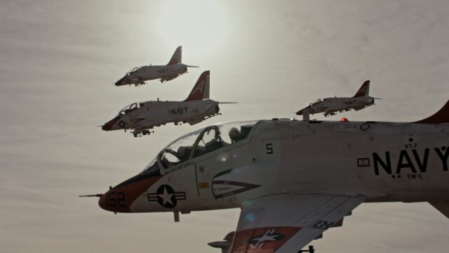 Four jets fly in close formation