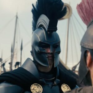 Ithacan king in full armor facing defeated foe on battlefield