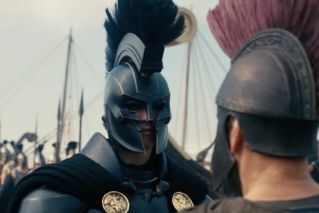 Ithacan king in full armor facing defeated foe on battlefield