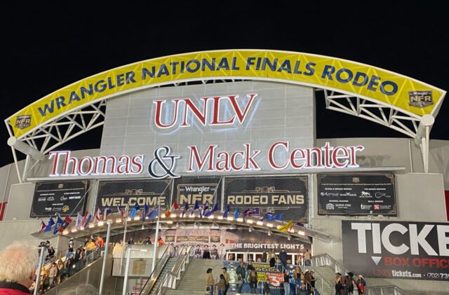 exterior view of Thomas & Mack area in Las Vegas with banner proclaiming the 2024 Wranger National Finals rodeo