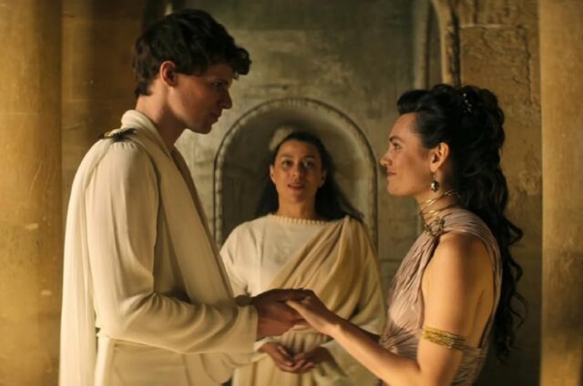 Orpheus (Ruairi O'Connor), son of Morpheus and Calliope, marries Eurydice (Ella Rumpf).