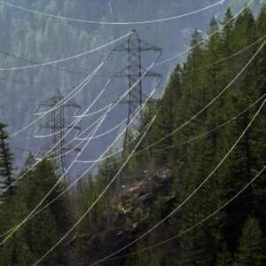 388423 16: Power lines carry electricity near Diablo Dam, April 15, 2001, near the North Cascades National Park, WA, but scant snow and rain is keeping the region's hydroelectric plants scrambling to produce enough energy for their own state's needs, leaving no extra electricity to bail California out of its energy crisis this summer. (Photo by David McNew/Newsmakers)