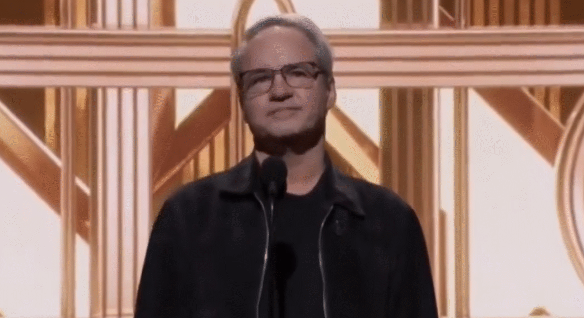 Vince Zampella standing on stage